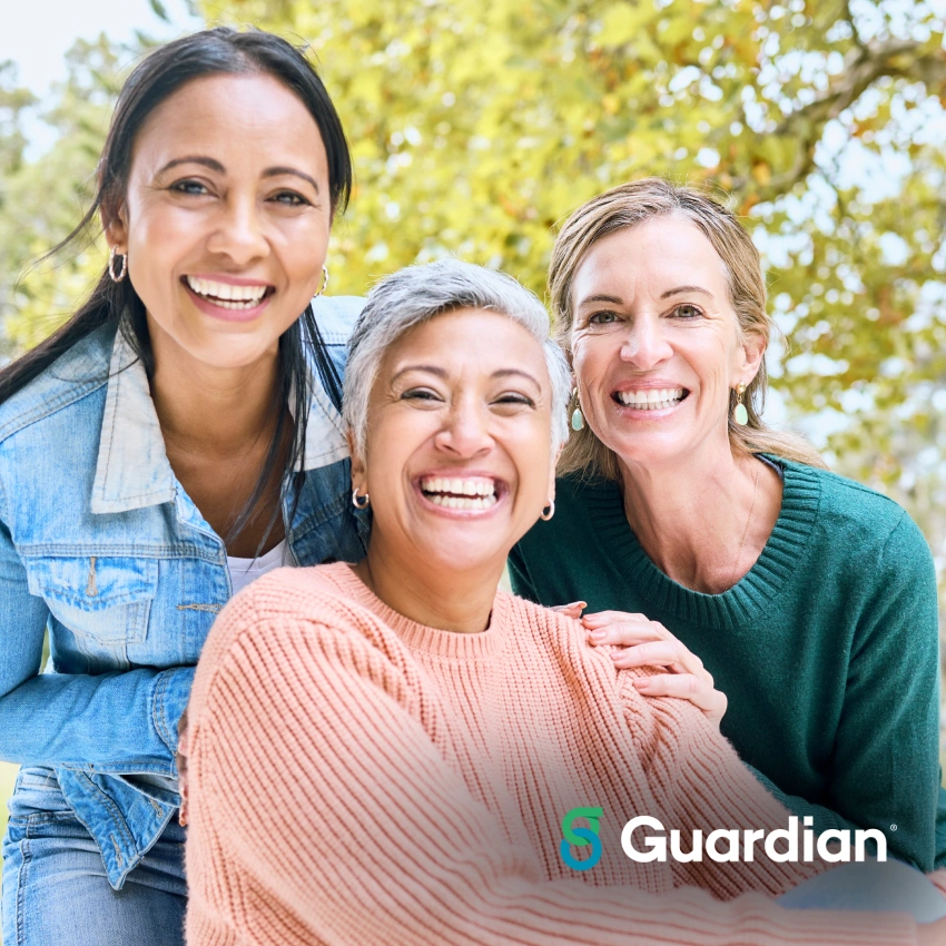 Smiling family representing Guardian dental insurance coverage.