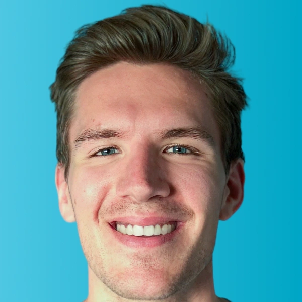 Patient after Invisalign treatment showing a straighter smile at Jamaica Plain Dental