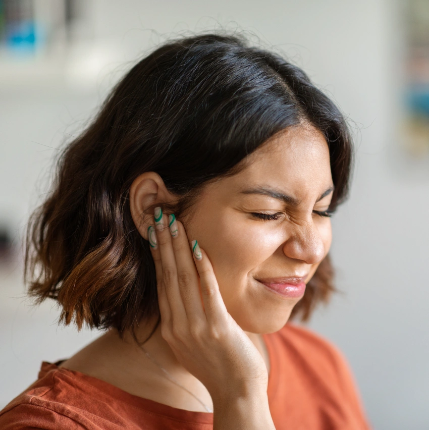 Patient receiving TMJ therapy for jaw pain relief at Jamaica Plain Dental